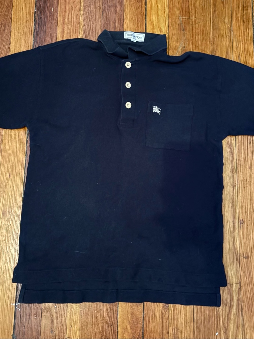 Burberrys Black Polo Shirt with Ivory Button